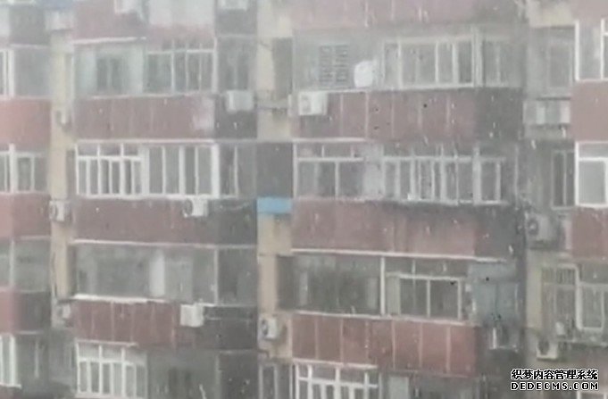 沐鸣直属招商北京市民拍下盛夏「飘雪」气象专家释疑