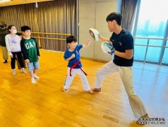 恒基物业管理部沐鸣注册鼎力支持 双人瑜伽轮创世界纪录